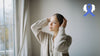 Woman running hands through hair