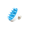 Blue and white grooming tool with spike-like design on a white background
