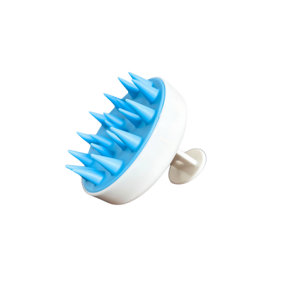 Blue and white grooming tool with spike-like design on a white background