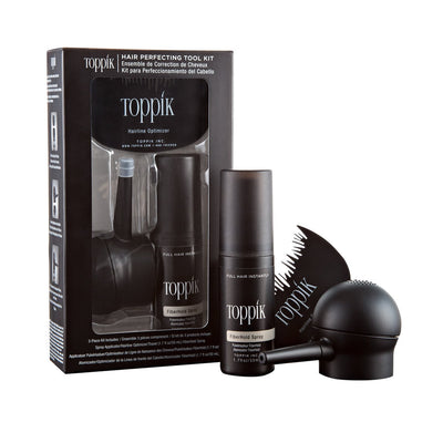 Toppik hair perfecting tool kit with packaging, spray bottle, and applicator on a white background